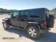 2007 Jeep Wrangler Unlimited Sahara z VIN 1J4GA59127L152918, wystawiony jako Copart lot #85123165 z przebiegiem 180 573 mil mil oraz Szkoda całkowita • Salvage title. Historia ofert i sprzedaży dostępna na DreamBid. Obrazek 2.