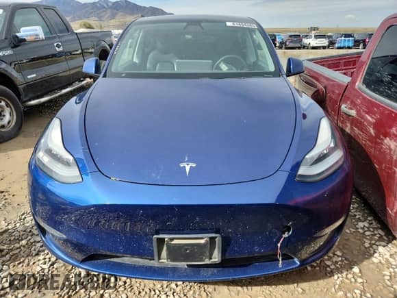 2020 Tesla Model Y Long Range z VIN 5YJYGDEF7LF014051, wystawiony jako Copart lot #81894885 z przebiegiem Nie podano mil oraz Szkoda całkowita • Salvage title. Historia ofert i sprzedaży dostępna na DreamBid. Obrazek 5.