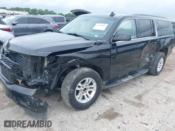 2020 Chevrolet Suburban LT with VIN 1GNSKHKC9LR103062, listed as a IAAI auction lot 42478008 with 229,786 mi miles and . Bid and sale history available at DreamBid. Image 2.