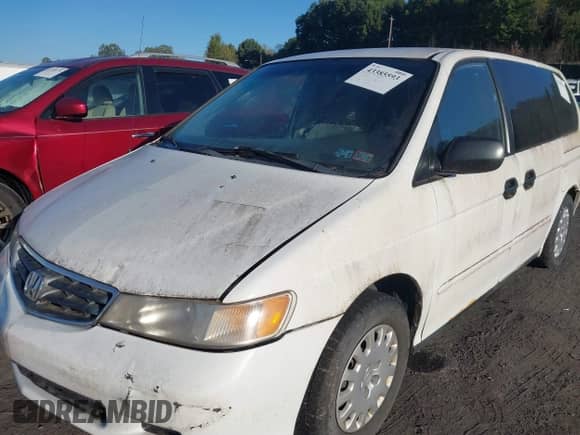 2002 Honda Odyssey LX с VIN 2HKRL18572H509884, выставлен на аукционе IAAI как лот 43385593 с пробегом 210 064 миль миль и . История ставок и продаж доступна на DreamBid. Изображение 6.