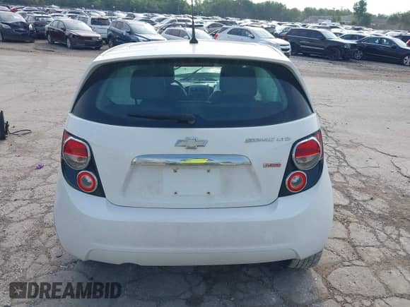 2013 Chevrolet Sonic LTZ with VIN 1G1JE6SB7D4203157, listed as a IAAI auction lot 42857551 with 110,001 mi miles and . Bid and sale history available at DreamBid. Image 16.