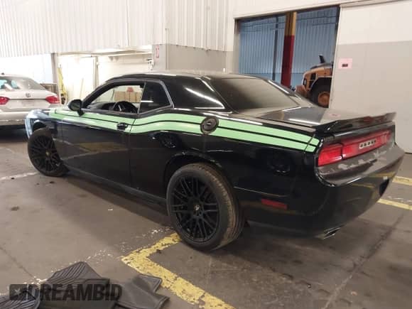 2013 Dodge Challenger SXT с VIN 2C3CDYAG7DH704245, выставлен на аукционе IAAI как лот 43250299 с пробегом Не указан миль и . История ставок и продаж доступна на DreamBid. Изображение 3.