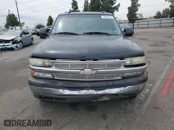 2004 Chevrolet Tahoe LT с VIN 1GNEC13T74R276242, выставлен на аукционе Copart как лот 70556415 с пробегом 177 615 миль миль и Списание • Salvage title. История ставок и продаж доступна на DreamBid. Изображение 5.