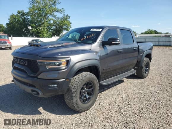 2021 Ram 1500 z VIN NCS107300, wystawiony jako Copart lot #66329055 z przebiegiem 25 123 mil mil oraz Szkoda całkowita • Salvage title. Historia ofert i sprzedaży dostępna na DreamBid. Obrazek 1.