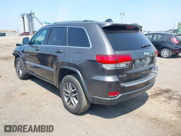 2021 Jeep Grand Cherokee Limited with VIN 1C4RJFBG2MC551746, listed as a IAAI auction lot 42806309 with 33,047 mi miles and . Bid and sale history available at DreamBid. Image 3.