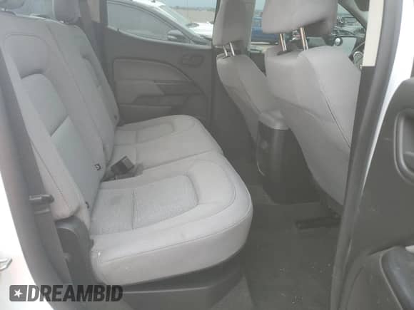 2018 Chevrolet Colorado 4WD Work Truck z VIN 1GCGTBEN3J1221187, wystawiony jako Copart lot #81585775 z przebiegiem 98 322 mil mil oraz Szkoda całkowita • Salvage title. Historia ofert i sprzedaży dostępna na DreamBid. Obrazek 10.