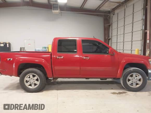 2011 Chevrolet Colorado 2LT with VIN 1GCHSDFE9B8117703, listed as a IAAI auction lot 42814839 with 180,021 mi miles and . Bid and sale history available at DreamBid. Image 13.