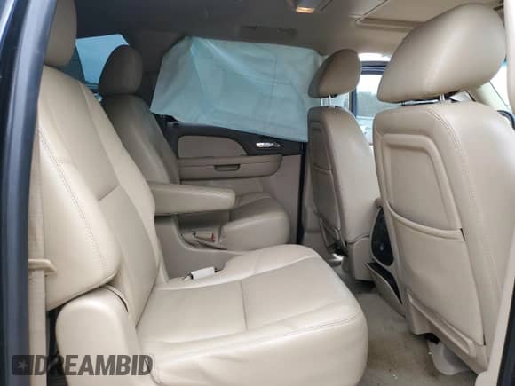 2014 Chevrolet Suburban LTZ с VIN 1GNSKKE7XER239070, выставлен на аукционе Copart как лот 85556165 с пробегом 186 343 миль миль и Чистый • Clean title. История ставок и продаж доступна на DreamBid. Изображение 11.