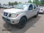 2011 Nissan Frontier Pro-4X z VIN 1N6AD0EV8BC434100, wystawiony jako IAAI lot #42745419 z przebiegiem 264 222 mil mil oraz . Historia ofert i sprzedaży dostępna na DreamBid. Obrazek 17.