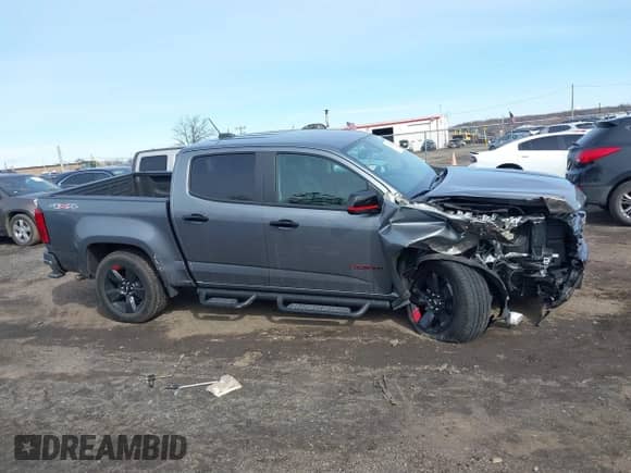 2022 Chevrolet Colorado 4WD LT z VIN 1GCGTCEN7N1145713, wystawiony jako IAAI lot #41617561 z przebiegiem 21 846 mil mil oraz . Historia ofert i sprzedaży dostępna na DreamBid. Obrazek 13.