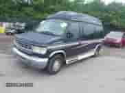 1999 Ford Econoline Cargo Recreational with VIN 1FDRE14L4XHA56517, listed as a IAAI auction lot 42186104 with 200,382 mi miles and . Bid and sale history available at DreamBid. Image 2.