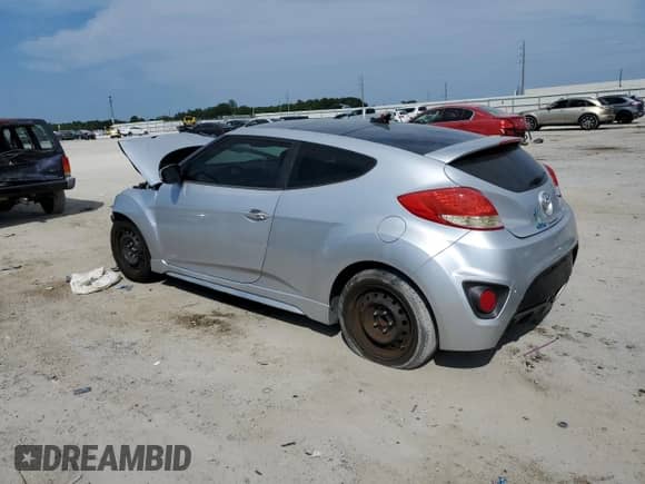 2013 Hyundai Veloster Turbo с VIN KMHTC6AE2DU101116, выставлен на аукционе Copart как лот 81190935 с пробегом 56 459 миль миль и Списание • Salvage title. История ставок и продаж доступна на DreamBid. Изображение 2.