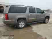 2013 Chevrolet Suburban LT с VIN 1GNSKJE79DR107572, выставлен на аукционе Copart как лот 68145015 с пробегом 218 004 миль миль и Списание • Salvage title. История ставок и продаж доступна на DreamBid. Изображение 3.