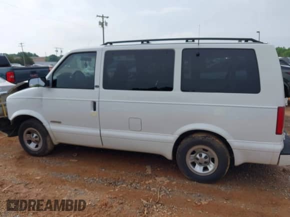 2002 Chevrolet Astro z VIN 1GNDM19X92B139649, wystawiony jako IAAI lot #42370076 z przebiegiem 209 886 mil mil oraz . Historia ofert i sprzedaży dostępna na DreamBid. Obrazek 14.
