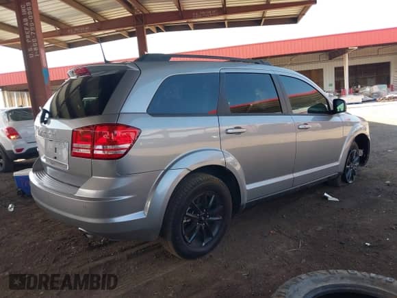 2020 Dodge Journey SE Value with VIN 3C4PDCAB3LT232412, listed as a IAAI auction lot 43155162 with 58,779 mi miles and . Bid and sale history available at DreamBid. Image 4.