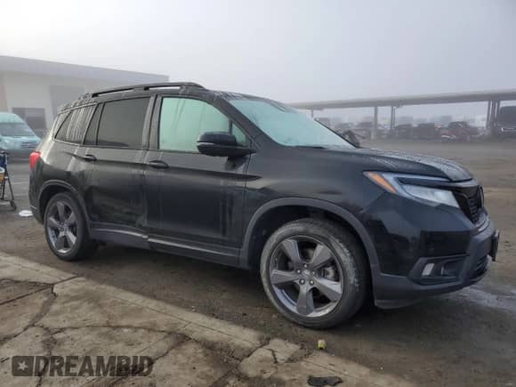 2021 Honda Passport Touring with VIN 5FNYF7H96MB011542, listed as a Copart auction lot 85740944 with 80,648 mi miles and Salvage title. Bid and sale history available at DreamBid. Image 4.