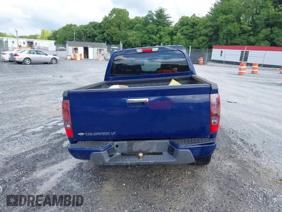 2011 Chevrolet Colorado 1LT z VIN 1GCHTCFE5B8124302, wystawiony jako IAAI lot #42494908 z przebiegiem 121 194 mil mil oraz . Historia ofert i sprzedaży dostępna na DreamBid. Obrazek 16.