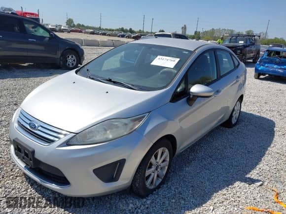 2012 Ford Fiesta SE с VIN 3FADP4BJ3CM157779, выставлен на аукционе IAAI как лот 43174760 с пробегом 137 367 миль миль и . История ставок и продаж доступна на DreamBid. Изображение 2.