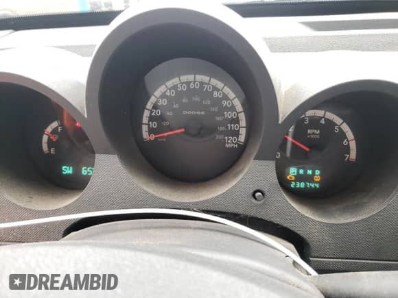 2009 Dodge Nitro SXT z VIN 1D8GU28K69W535771, wystawiony jako Copart lot #79497404 z przebiegiem 238 744 mil mil oraz Czysty tytuł • Clean title. Historia ofert i sprzedaży dostępna na DreamBid. Obrazek 9.