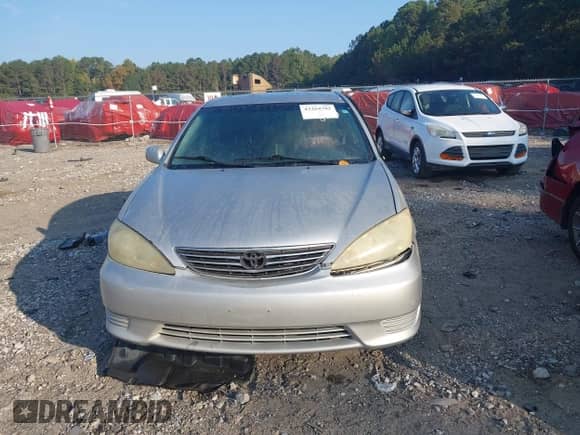 2006 Toyota Camry LE z VIN 4T1BE32K26U670057, wystawiony jako IAAI lot #43264782 z przebiegiem 257 103 mil mil oraz . Historia ofert i sprzedaży dostępna na DreamBid. Obrazek 12.