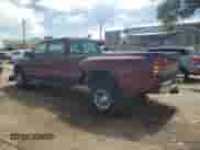 2002 Chevrolet Silverado 1500 с VIN 1GCJC33G92F215561, выставлен на аукционе Copart как лот 62516525 с пробегом 115 028 миль миль и Списание • Salvage title. История ставок и продаж доступна на DreamBid. Изображение 2.