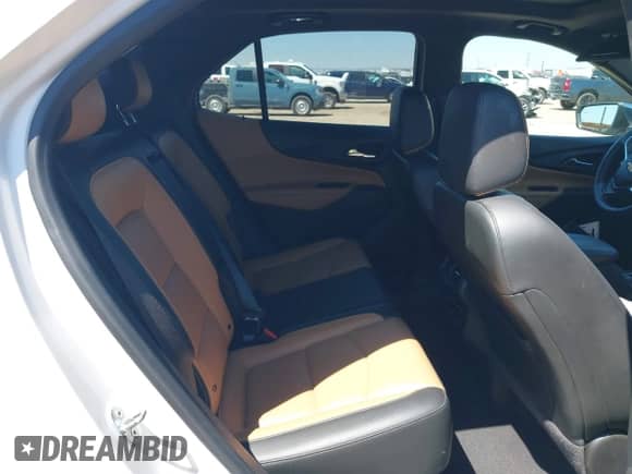 2018 Chevrolet Equinox Premier with VIN 2GNAXVEVXJ6104478, listed as a IAAI auction lot 43056014 with 82,627 mi miles and . Bid and sale history available at DreamBid. Image 8.