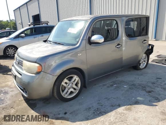 2012 Nissan Cube SL with VIN JN8AZ2KR0CT255062, listed as a Copart auction lot 58549275 with 130,369 mi miles and Salvage title. Bid and sale history available at DreamBid. Image 1.