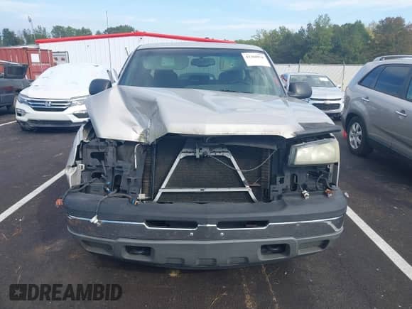 2005 Chevrolet Silverado 1500 LS z VIN 2GCEC19V751152385, wystawiony jako IAAI lot #43360918 z przebiegiem 158 152 mil mil oraz . Historia ofert i sprzedaży dostępna na DreamBid. Obrazek 13.