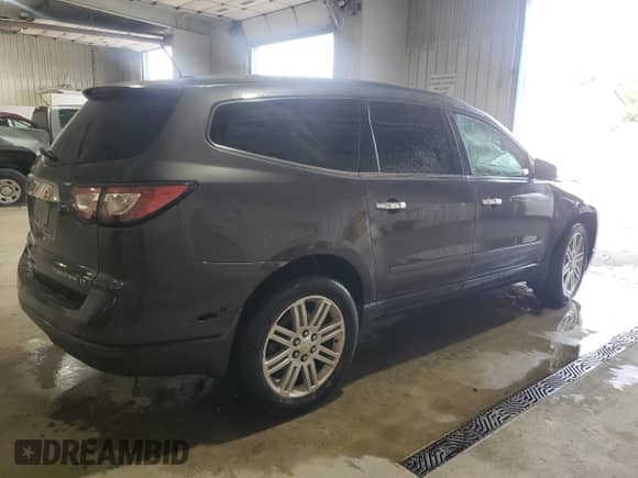 2014 Chevrolet Traverse LT with VIN 1GNKVGKD5EJ136149, listed as a Copart auction lot 71306945 with Not provided miles and Salvage title. Bid and sale history available at DreamBid. Image 3.
