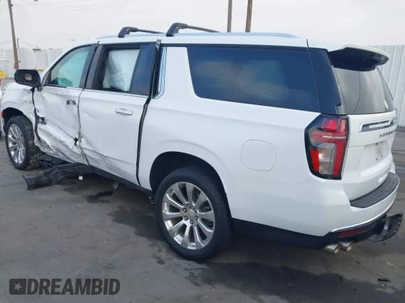 2021 Chevrolet Suburban Premier z VIN 1GNSKFKDXMR185737, wystawiony jako IAAI lot #42087355 z przebiegiem Nie podano mil oraz . Historia ofert i sprzedaży dostępna na DreamBid. Obrazek 3.
