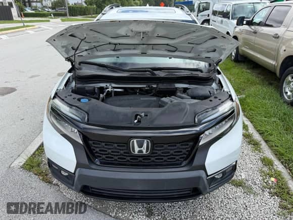 2021 Honda Passport Touring с VIN 5FNYF7H9XMB009275, выставлен на аукционе Copart как лот 83768205 с пробегом 23 402 миль миль и Списание • Salvage title. История ставок и продаж доступна на DreamBid. Изображение 7.