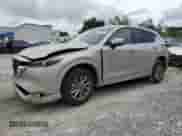 2025 Mazda CX-5 S Select z VIN JM3KFBBL4S0711463, wystawiony jako Copart lot #80895695 z przebiegiem 1 618 mil mil oraz Nie do naprawy • Non repairable. Historia ofert i sprzedaży dostępna na DreamBid. Obrazek 1.