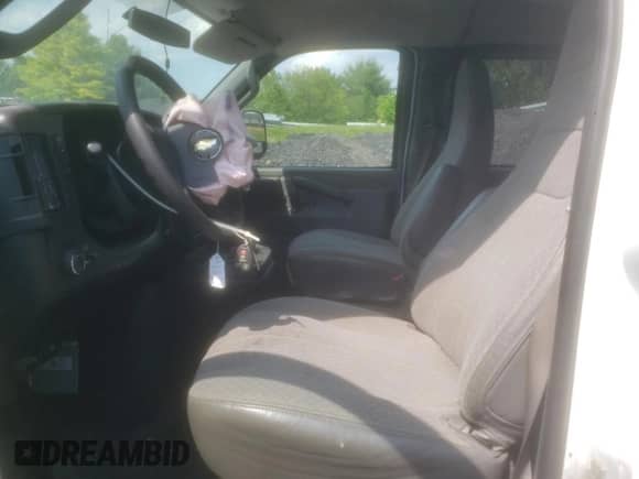 2017 Chevrolet Express Passenger LT with VIN 1GAZGPFG1H1180345, listed as a Copart auction lot 59101435 with 146,791 mi miles and Salvage title. Bid and sale history available at DreamBid. Image 7.