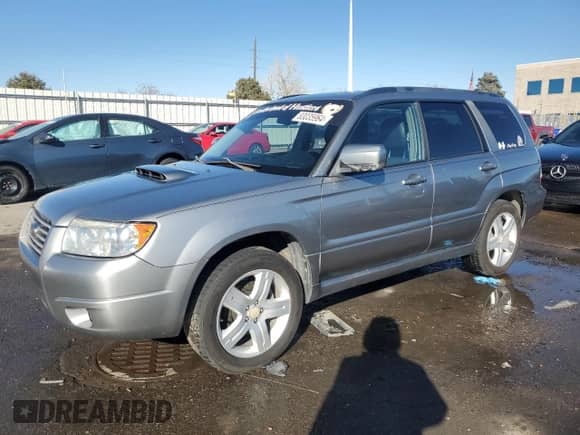 2007 Subaru Forester Special Sports XT z VIN JF1SG69607H700214, wystawiony jako Copart lot #83035964 z przebiegiem 211 742 mil mil oraz Szkoda całkowita • Salvage title. Historia ofert i sprzedaży dostępna na DreamBid. Obrazek 1.