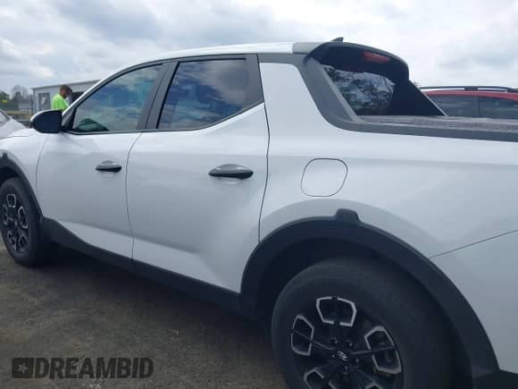 2023 Hyundai Santa Cruz SE with VIN 5NTJADAE4PH072174, listed as a IAAI auction lot 41833752 with 111,424 mi miles and . Bid and sale history available at DreamBid. Image 14.