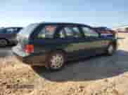 1997 Saturn SW with VIN 1G8ZK8278VZ379899, listed as a Copart auction lot 74913664 with 126,186 mi miles and Salvage title. Bid and sale history available at DreamBid. Image 3.