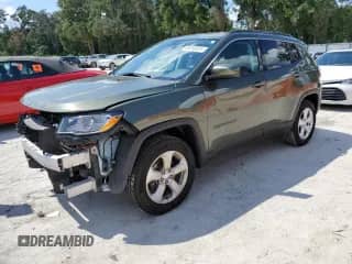 2018 Jeep Compass Altitude with VIN 3C4NJDBB3JT281479, listed as a Copart auction lot 69296825 with 63,746 mi miles and Salvage title. Bid and sale history available at DreamBid. Image 1.