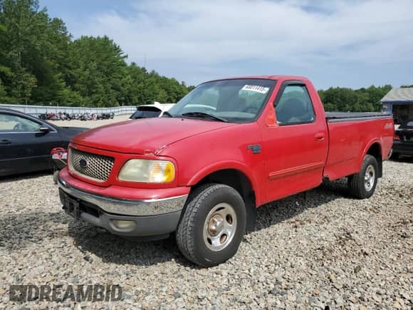 2002 Ford F-150 XL with VIN 2FTRF18W42CA66874, listed as a Copart auction lot 68011415 with 79,613 mi miles and Clean title. Bid and sale history available at DreamBid. Image 1.