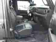 2021 Jeep Wrangler Unlimited Sahara High Altitude с VIN 1C4HJXENXMW503535, выставлен на аукционе IAAI как лот 41212320 с пробегом 70 375 миль миль и . История ставок и продаж доступна на DreamBid. Изображение 5.