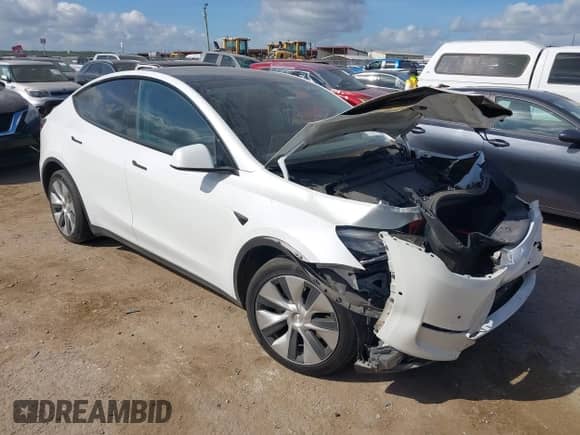 2022 Tesla Model Y Long Range z VIN 7SAYGDEEXNF353853, wystawiony jako IAAI lot #42792563 z przebiegiem 84 692 mil mil oraz . Historia ofert i sprzedaży dostępna na DreamBid. Obrazek 1.