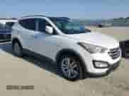 2015 Hyundai Santa Fe with VIN 5XYZW4LAXFG268199, listed as a Copart auction lot 68005855 with 174,098 mi miles and Clean title. Bid and sale history available at DreamBid. Image 4.