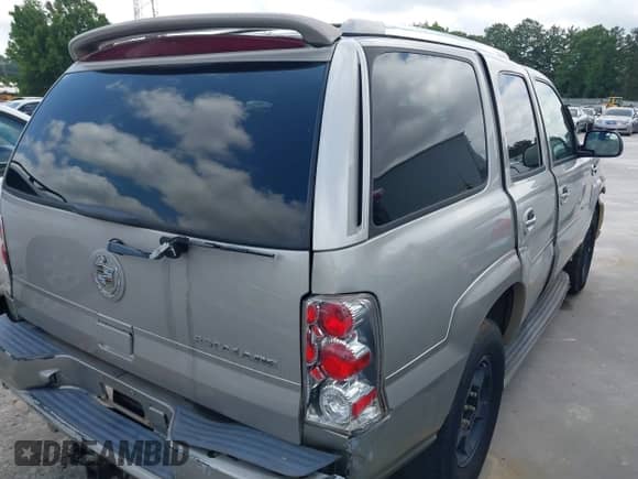 2004 Cadillac Escalade with VIN 1GYEK63NX4R317712, listed as a IAAI auction lot 42490729 with 294,798 mi miles and . Bid and sale history available at DreamBid. Image 4.