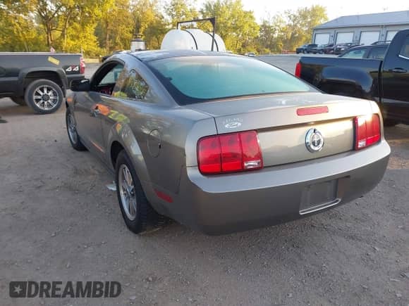 2005 Ford Mustang Deluxe with VIN 1ZVFT80N855119319, listed as a IAAI auction lot 43340661 with 106,385 mi miles and . Bid and sale history available at DreamBid. Image 3.