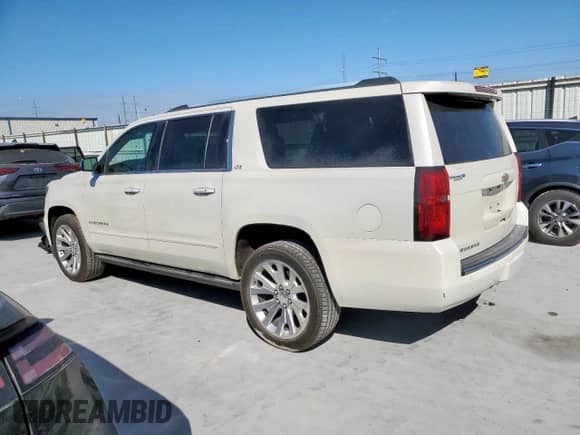 2015 Chevrolet Suburban LTZ с VIN 1GNSKKKCXFR162722, выставлен на аукционе Copart как лот 82402645 с пробегом 127 137 миль миль и Чистый • Clean title. История ставок и продаж доступна на DreamBid. Изображение 2.