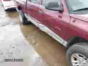 2001 Dodge Dakota Sport with VIN 1B7HL2AN11S318912, listed as a IAAI auction lot 42101199 with 128,006 mi miles and . Bid and sale history available at DreamBid. Image 6.