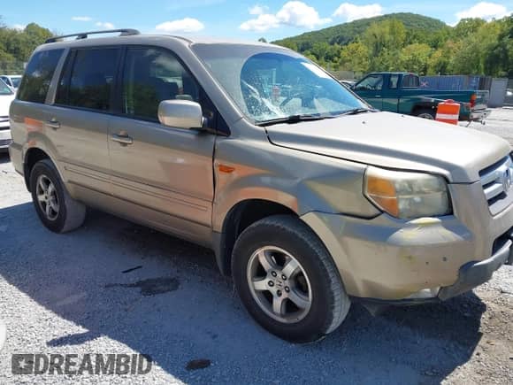 2006 Honda Pilot EX-L z VIN 2HKYF18566H508394, wystawiony jako IAAI lot #43119896 z przebiegiem 258 896 mil mil oraz . Historia ofert i sprzedaży dostępna na DreamBid. Obrazek 1.