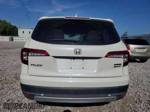 2019 Honda Pilot Touring 8-Passenger z VIN 5FNYF6H91KB085992, wystawiony jako Copart lot #57555005 z przebiegiem 59 063 mil mil oraz Szkoda całkowita • Salvage title. Historia ofert i sprzedaży dostępna na DreamBid. Obrazek 6.
