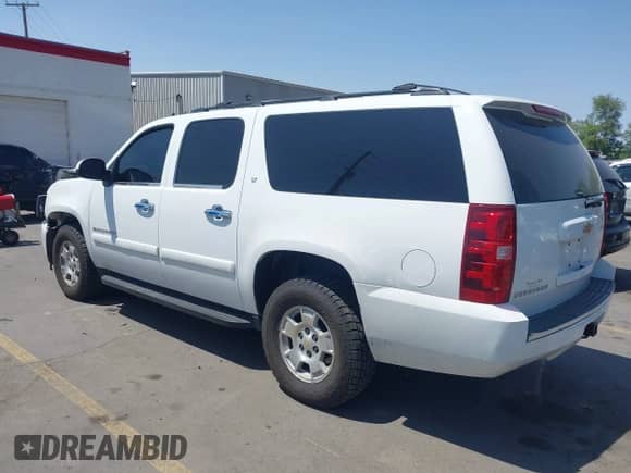 2007 Chevrolet Suburban LTZ with VIN 1GNFK163X7J305481, listed as a IAAI auction lot 42402983 with 147,778 mi miles and . Bid and sale history available at DreamBid. Image 3.