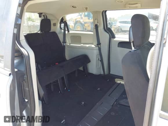 2013 Dodge Grand Caravan SXT with VIN 2C4RDGCG5DR669051, listed as a IAAI auction lot 42690993 with Not provided miles and . Bid and sale history available at DreamBid. Image 8.