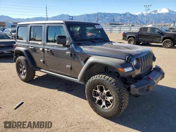 2023 Jeep Wrangler Rubicon with VIN 1C4HJXFN6PW509741, listed as a Copart auction lot 81324394 with 21,755 mi miles and Salvage title. Bid and sale history available at DreamBid. Image 4.